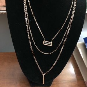 Three strand bar necklace with pendant